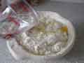 Adding cold water to dough ingredients Adding cold water to dough ingredients