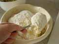 Cutting dough into smaller pieces Cutting dough into smaller pieces
