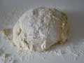 Dough on floured board Dough on floured board