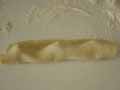 Folding pastry over the tortelli mounds Folding pastry over the tortelli mounds