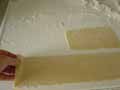 Laying out the tortelli pastry Laying out the tortelli pastry