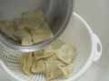 Draining the tortelli Draining the tortelli